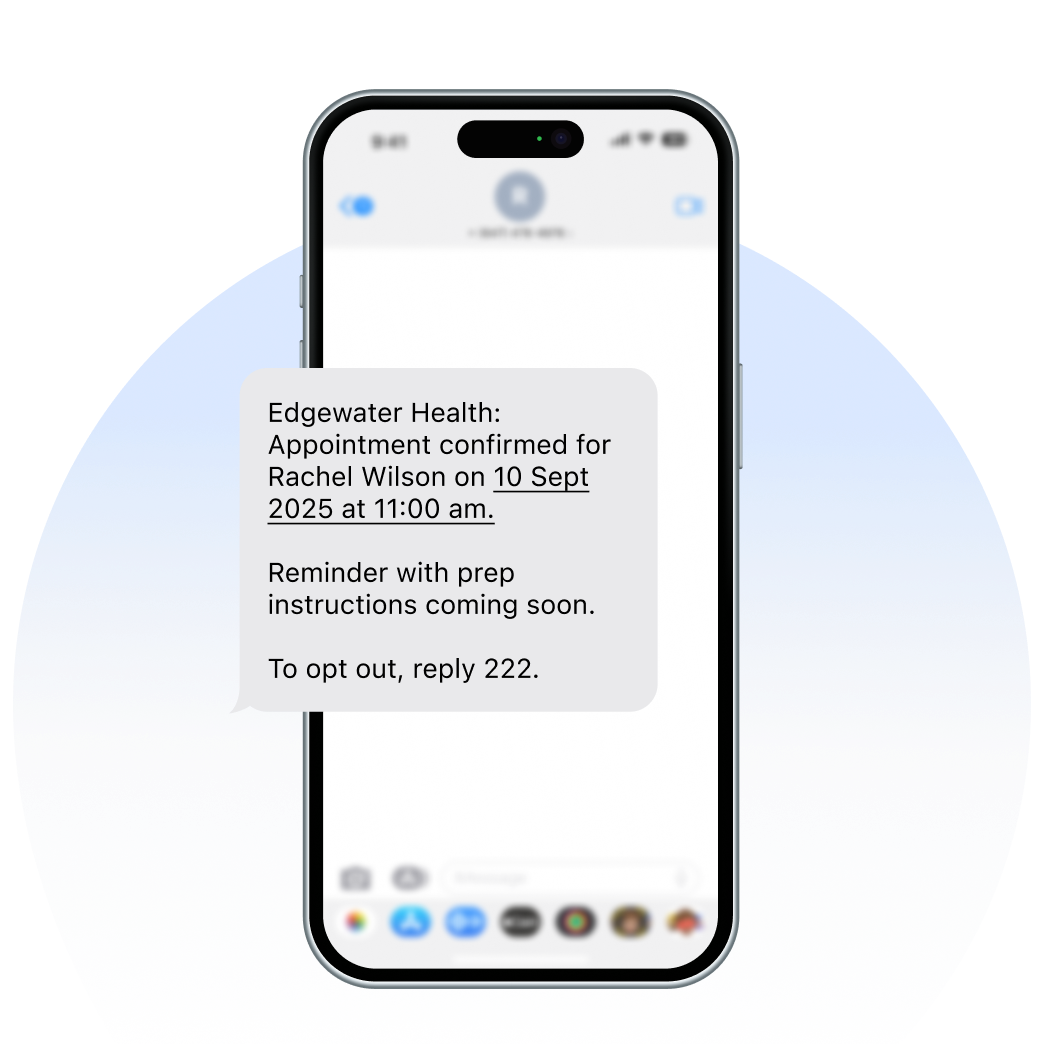 A smartphone screen displays a text message that a patient’s appointment has been confirmed.
