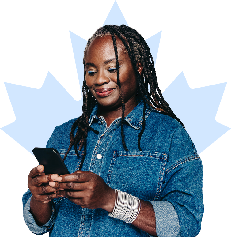 Patient smiles while looking down at their phone.