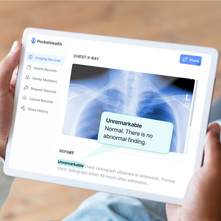 person holding a tablet with imaging report
