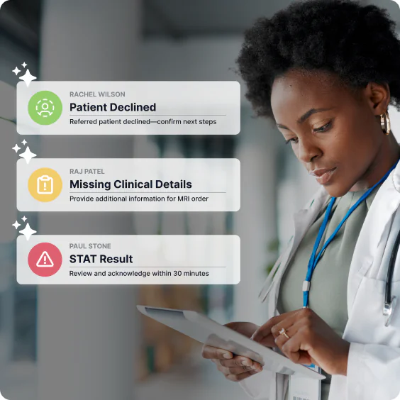 Notifications for a STAT result, missing clinical details and a declined referral, over a photo of a physician reading a tablet