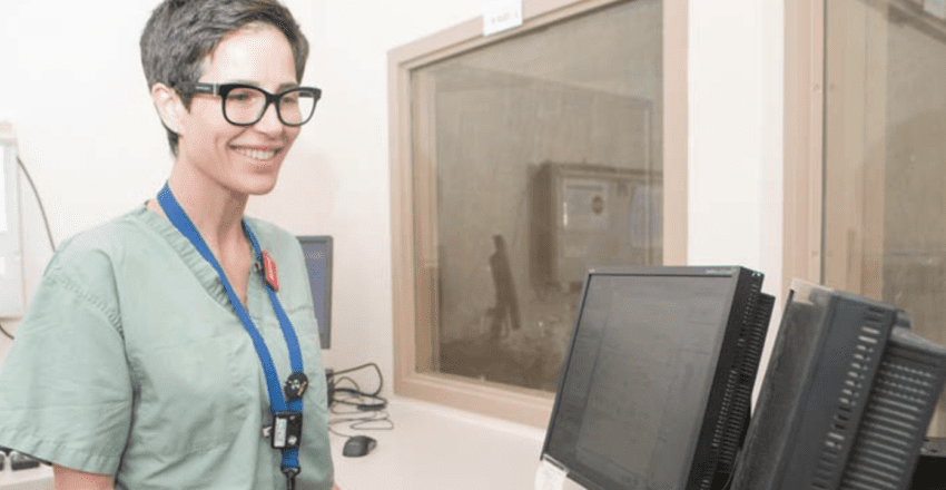 Nurse prepares to upload xray