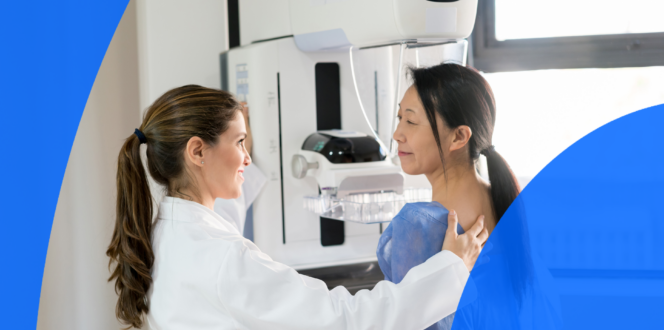 Radiologist guiding patient through her mammogram