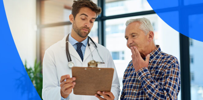Doctor with clipboard reading charts to older man