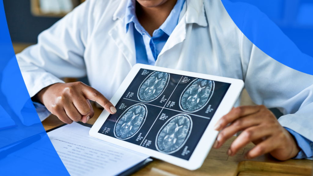 Doctor pointing out various MRI scans
