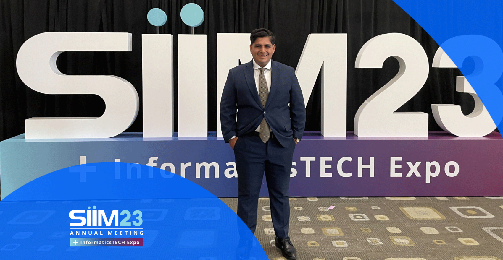 PocketHealth CEO Rishi Nayyar Standing in Front of 2023 SIIM Conference Sign