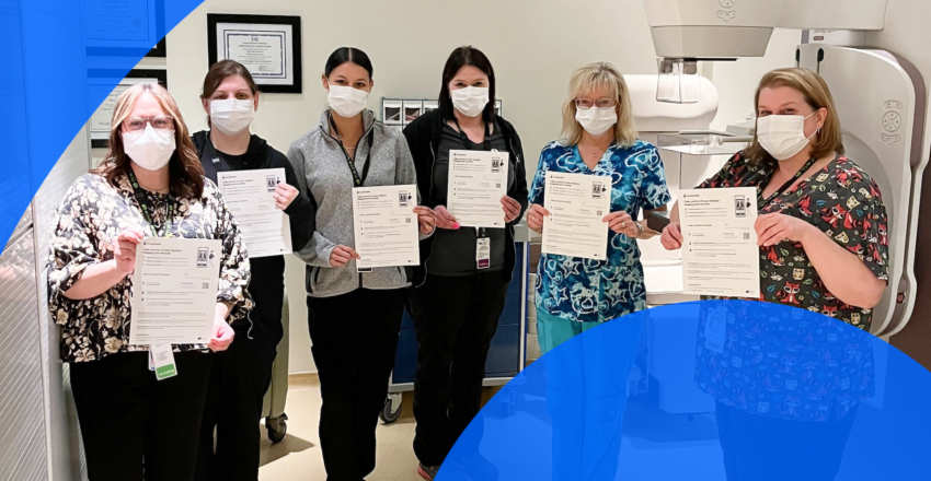 Sault Area Hospital Staff Holds PocketHealth Sign Up Forms for World Health Day Competition 2023