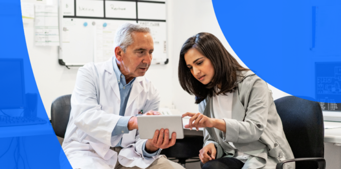 2 healthcare providers reviewing enterprise image exchange solution on tablet