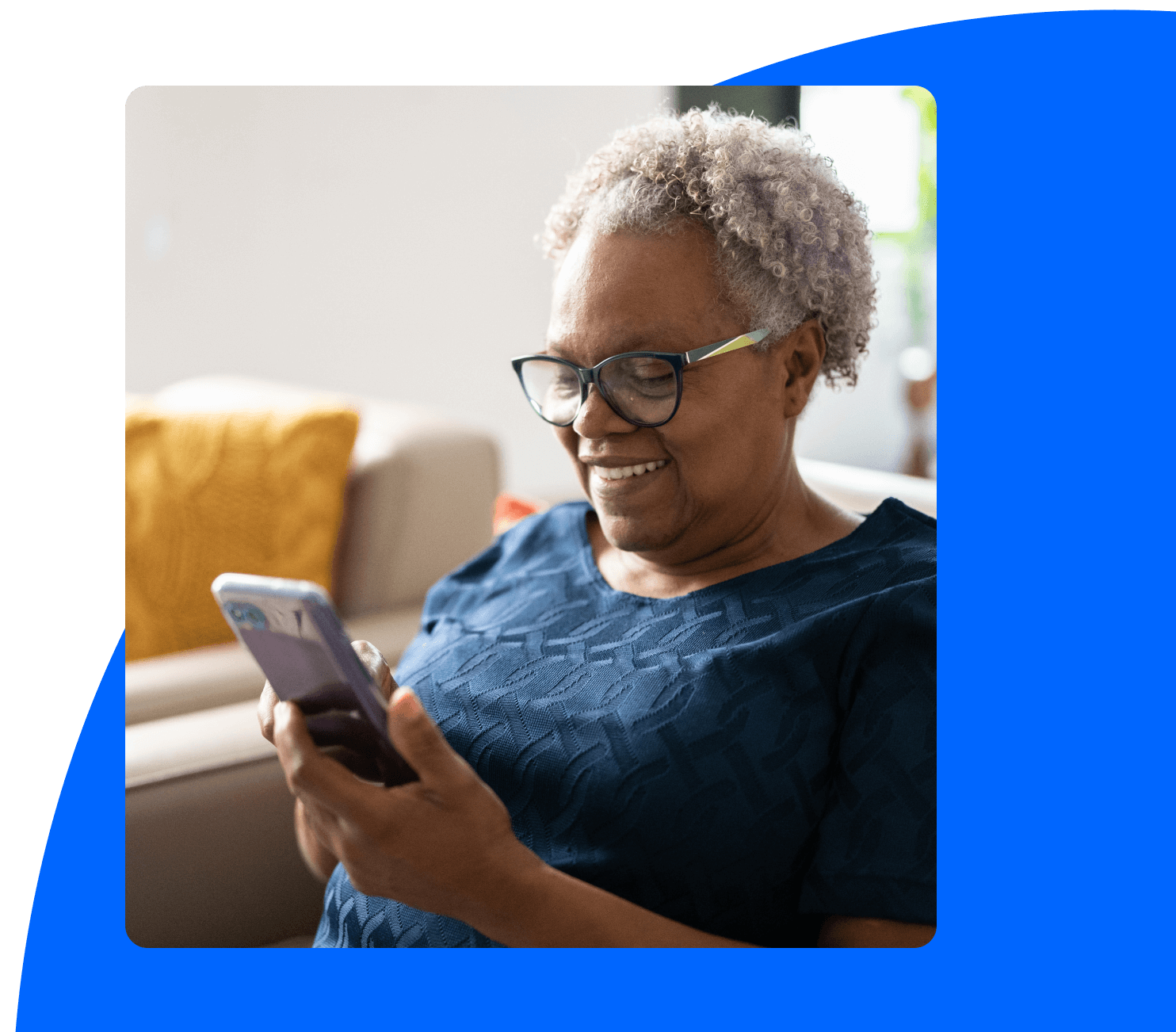 Smiling patient accessing electronic health records online through their phone