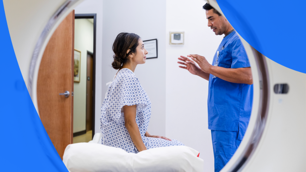 A patient being instructed by a technician on an exam table