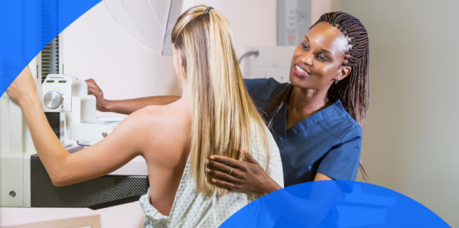 Patient getting a mammogram from a technician