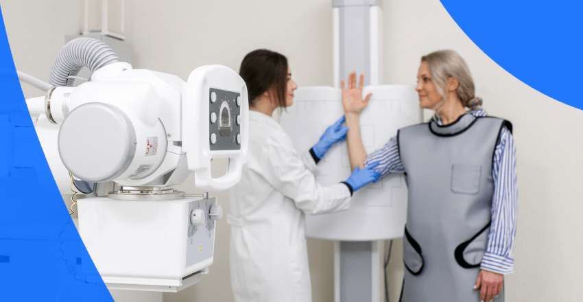 Patient getting an X-ray with technician