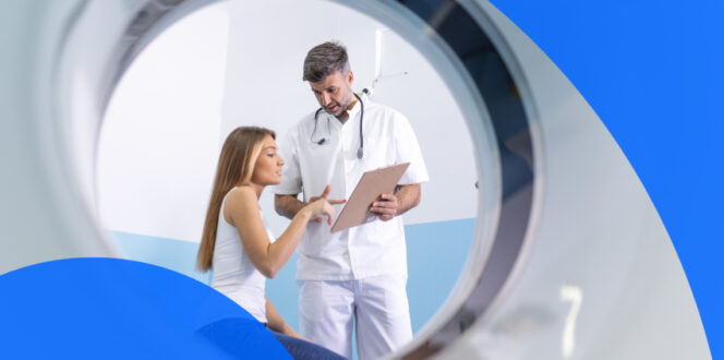 Patient talking with CT scan technician