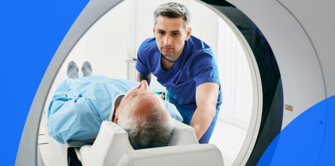 Patient with technician getting a CT scan