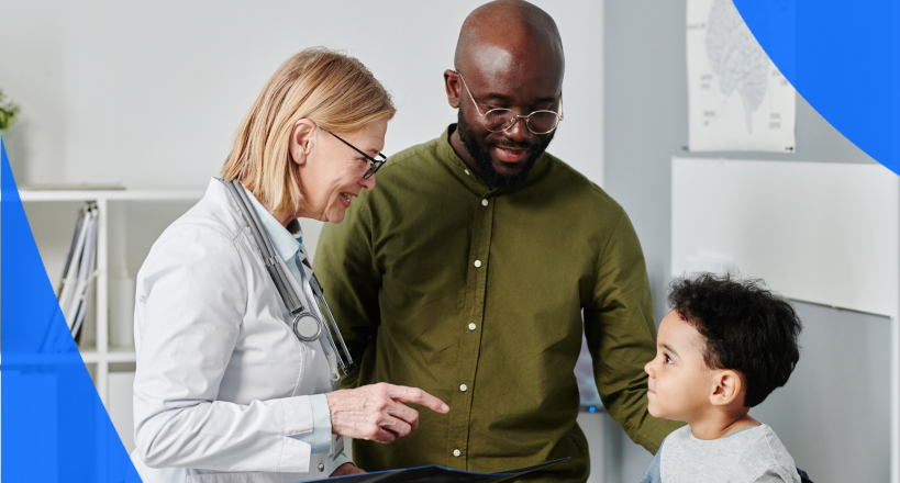 Family doctor guiding a father and son on how to obtain medical records Ontario.